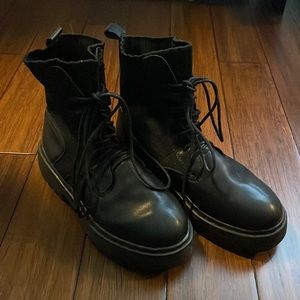 Black leather laced combat boots
